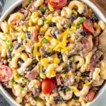 Bowl of Cowboy Pasta Salad with vibrant vegetables and pasta