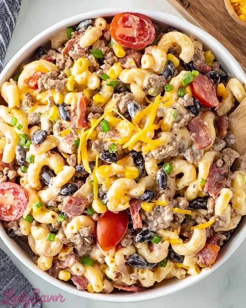 Bowl of Cowboy Pasta Salad with vibrant vegetables and pasta